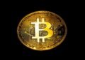 Bitcoin logo with gold coins