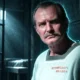 Sinestro talks to Hal Jordan from a prison cell
